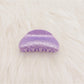 Beau marble pattern claw clip displayed alongside matching accessories