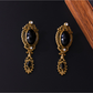 Earedge - Ornate Bow Detail Alloy Stud Earrings
