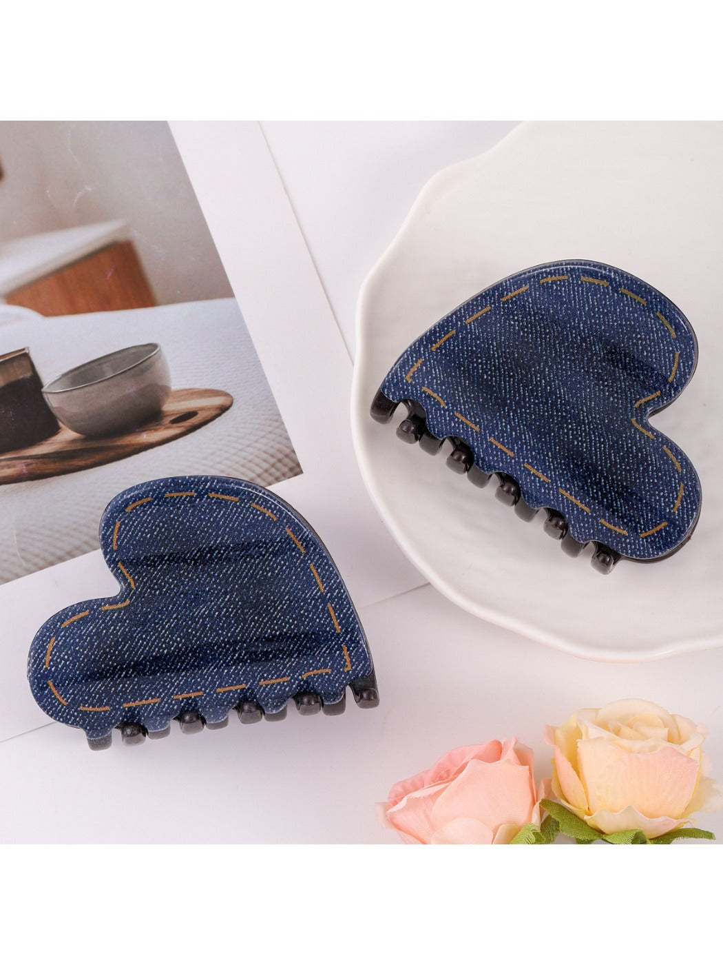 Close-up of Beau hair clip highlighting heart pattern and metal clasp