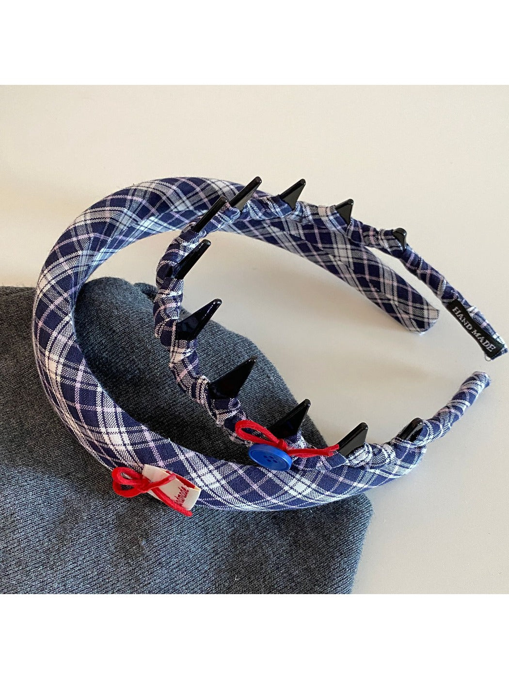 Close-up of blue scrunchie showing fabric texture and elastic band