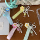 Keypus - Plumeria Bow Ice Cream Accent Bag Charm Keychain