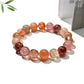 Lovra bracelet displayed on a wrist, highlighting vibrant crystal beads and adjustable fit