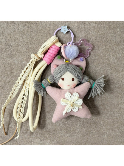 Back view of Keypus fabric cartoon doll keychain showing plain fabric surface
