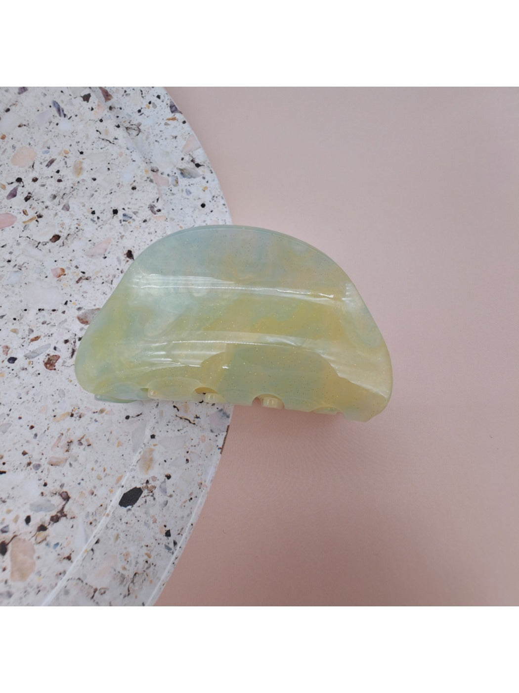 Beau hair clip worn on side of head with hair pulled back