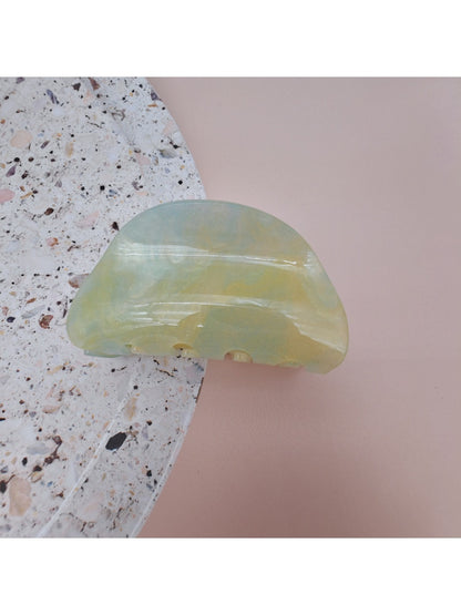 Beau hair clip worn on side of head with hair pulled back
