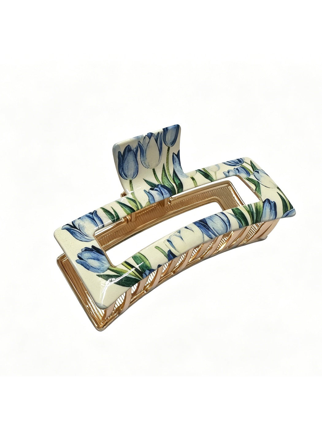 Beau hair clip worn in styled hair, showcasing its decorative flower pattern