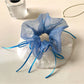 Side view of Gifty double layer plaid hair scrunchie highlighting elastic band inside