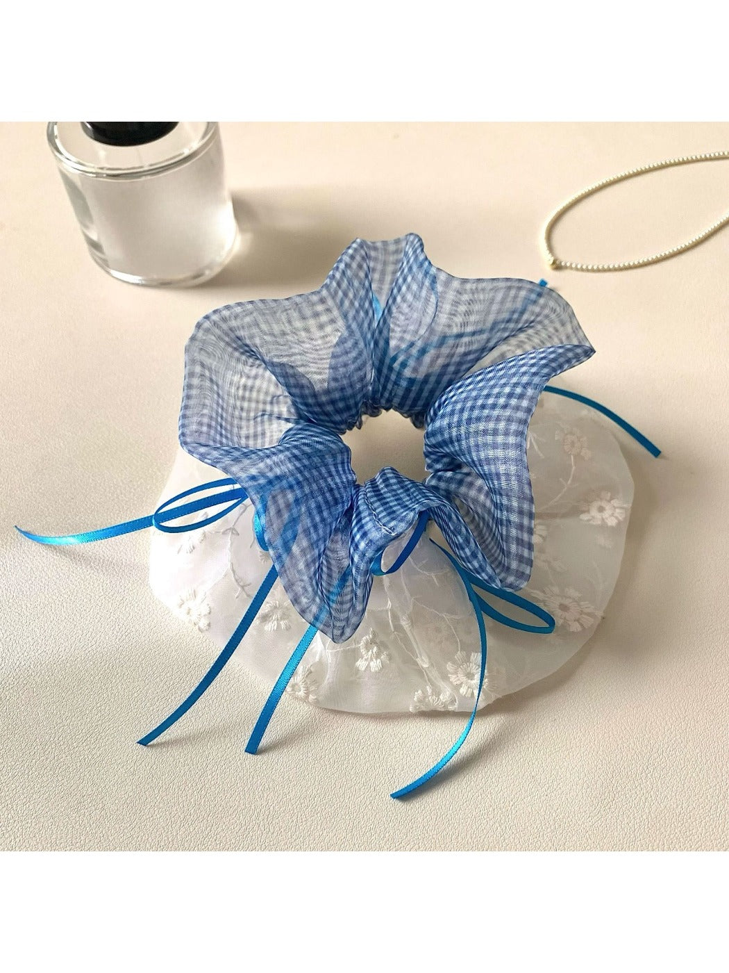 Side view of Gifty double layer plaid hair scrunchie highlighting elastic band inside