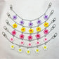 Side view of minimalist flower pendant with smooth gold finish