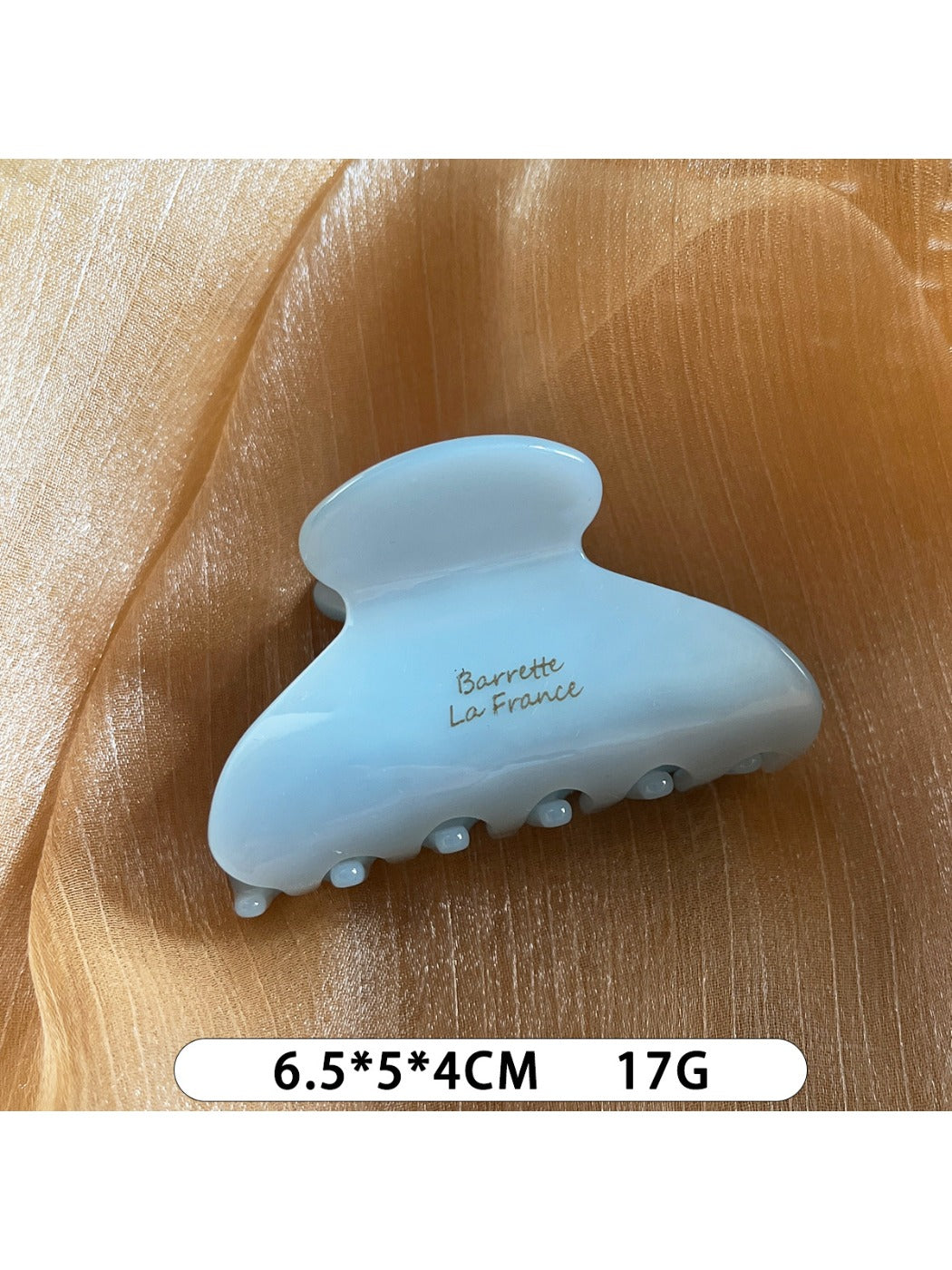Beau Sweet Chic acetate claw clip displayed open to show inner teeth design