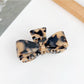 Beau bow shaped claw clip displayed in a gift box with soft padding