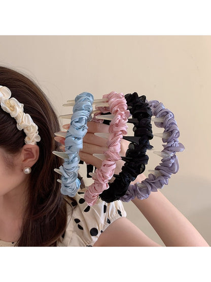 Side view of Gifty minimalist twist headband showing fabric texture