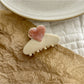 Beau heart shaped acetate claw clip styled in hair to demonstrate use and size
