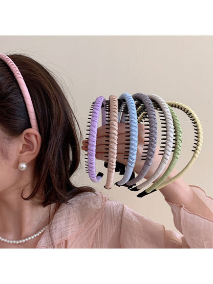 Close-up of Gifty solid color headband showing smooth fabric texture