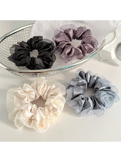 Gifty satin tulle scrunchie with ruffle trim on white background