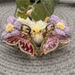 Ornate butterfly shaped hair clip with intricate filigree design in gold tone