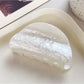 Beau macaron colored claw clip angled to show smooth glossy finish