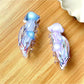 Side view of Beau jellyfish claw clip highlighting its curved shape and smooth finish