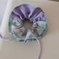 Gifty checkered bow ribbon scrunchie with black and white check pattern
