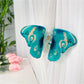 Beau butterfly hair claw clip with hair strands clipped inside