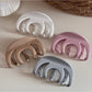 Side angle of Beau smooth surface hair clip showing sleek design