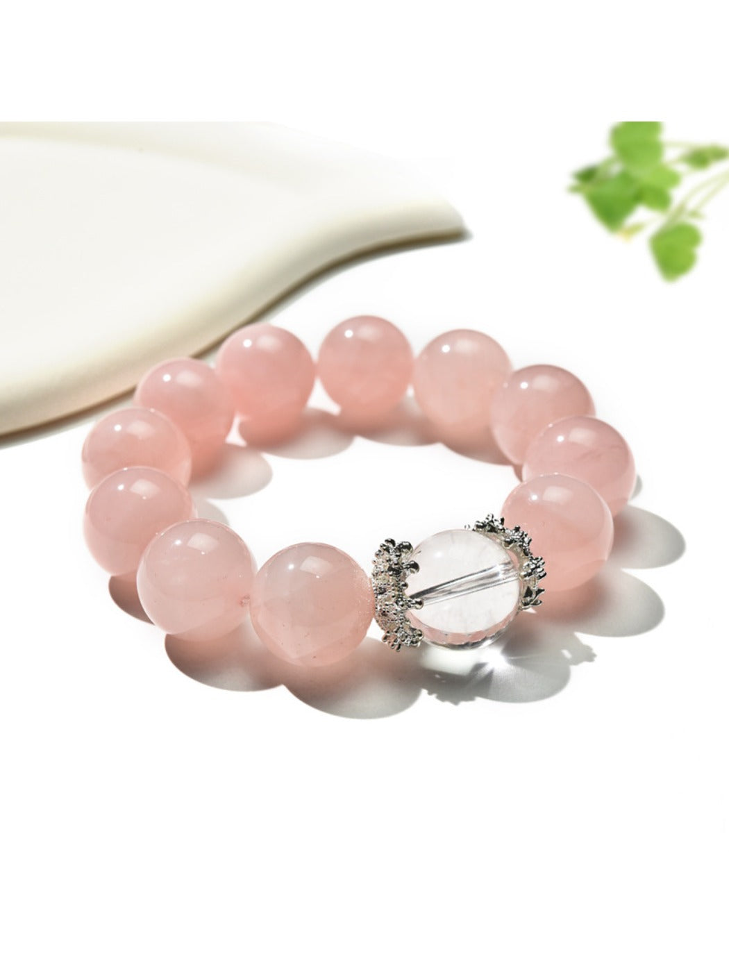 Side view of Lovra pink crystal bracelet highlighting bead texture and shine