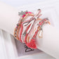 Detailed shot of Lovra bracelet clasp and bead strands on white surface