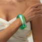 Lovra colorful bangle bracelet shown with matching accessories