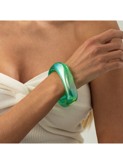 Lovra colorful bangle bracelet shown with matching accessories