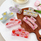 Beau square claw clip with colorful cute fruit pattern on a white background