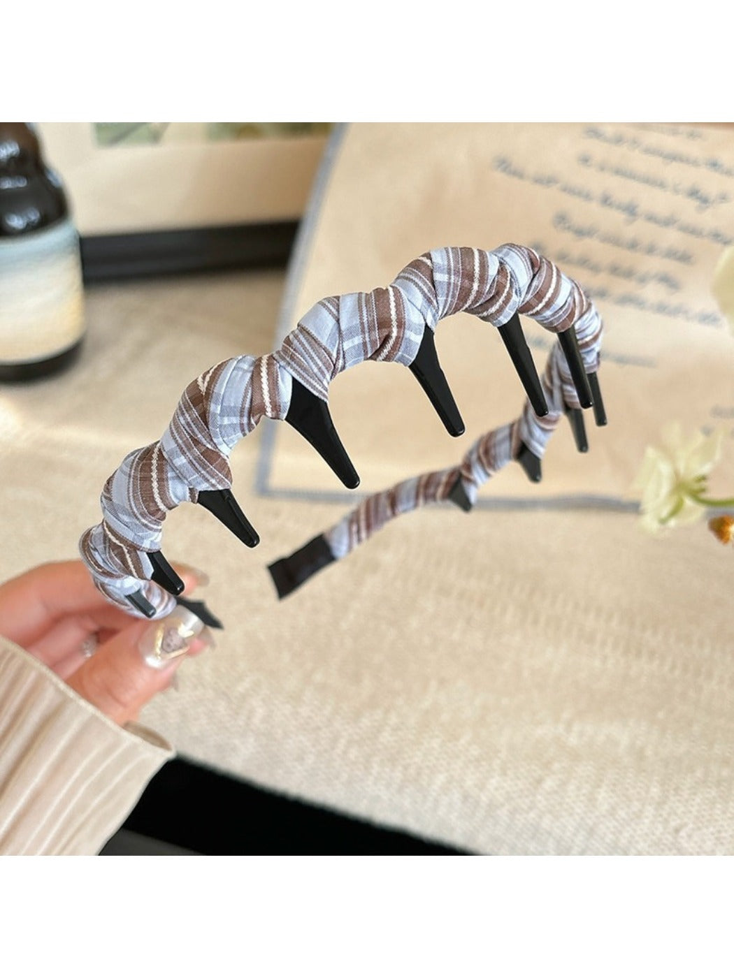 Side view of the polka dot headband highlighting its slim profile