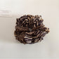 Leopard print ruched scrunchie photographed with natural lighting