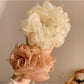 Side view of Gifty vintage scrunchie highlighting bead embellishments and elastic band