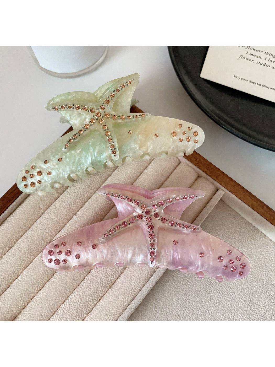 Side view of the colorful crescent hair claw clip highlighting its curved shape