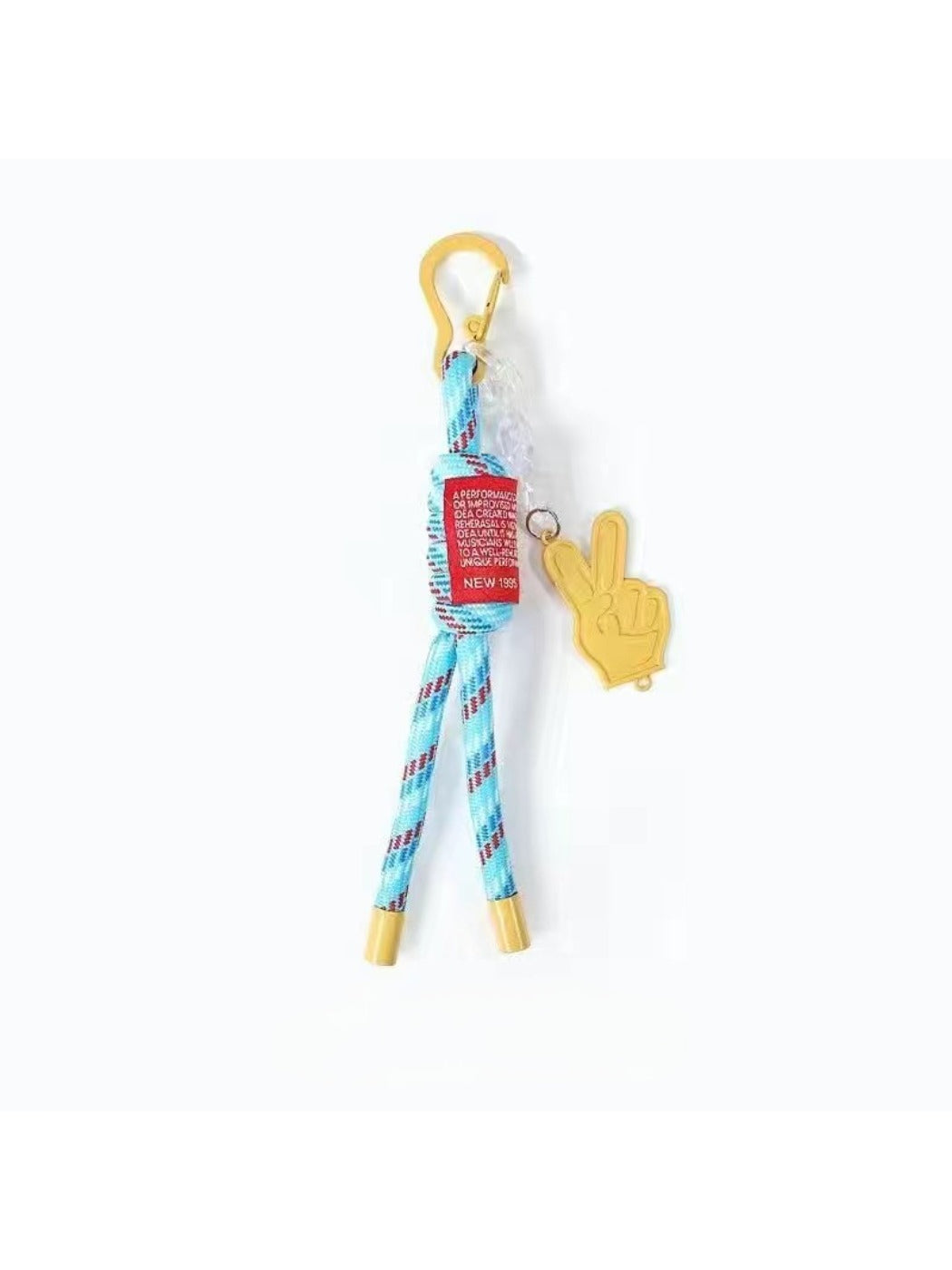 Keypus keychain clipped to a belt loop with keys hanging from the cord