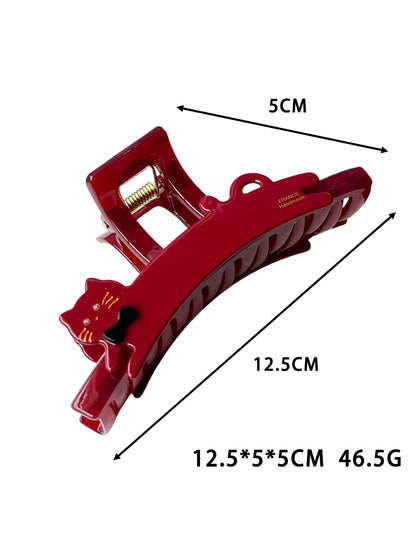 Side view of Beau cat-shaped acetate claw clip highlighting curved shape