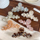Beau elegant floral half round claw clip on white background