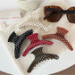 Beau simple acetate hair clip with black and white polka dot pattern