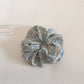 Gifty scrunchie packaged in a clear bag with branding visible