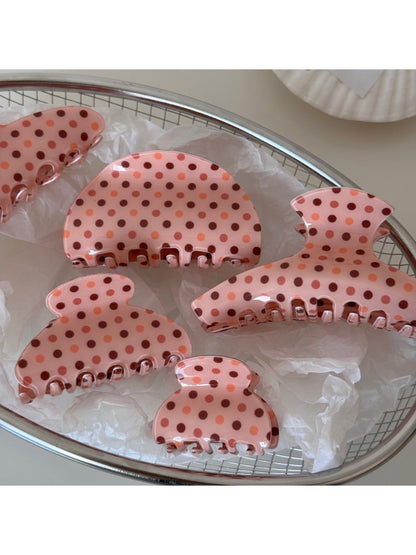 Side view of Beau pink polka dot hair clip highlighting thickness and texture
