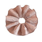 Soft pink scrunchie styled in a ponytail on a model with blonde hair