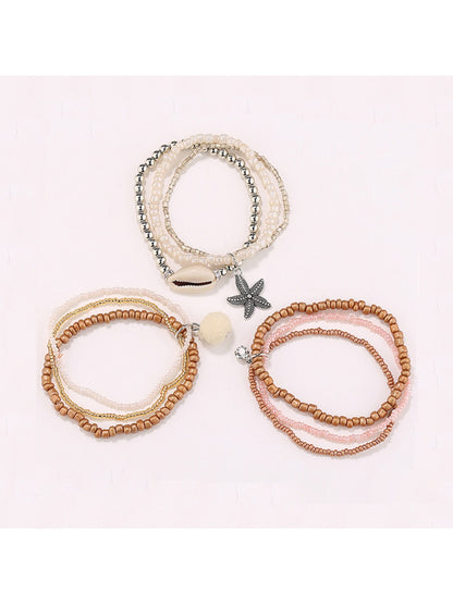 Close-up of Lovra bracelet showing detailed small gold and silver beads