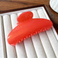 Beau hair clip shown with natural light emphasizing matte texture
