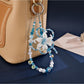 Keypus - Sculpted Iris Flower Beaded Bag Charm Keychain