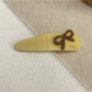 Beau - Bow Embellished Oval Hair Clip