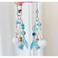 Blue Drift Bottle keychain with a cork stopper and attached metal keyring