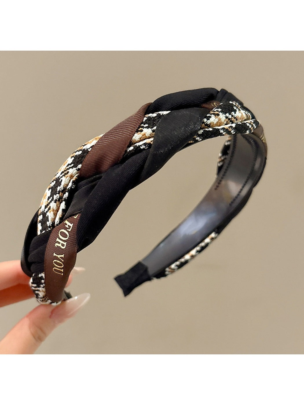 Side view of Gifty fabric woven twist headband showing texture and weave