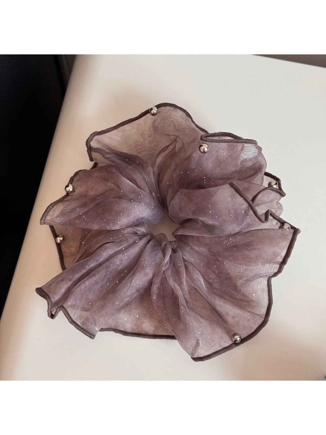 Large sparkly pink tulle scrunchie shown from above