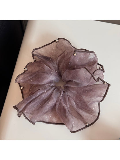Large sparkly pink tulle scrunchie shown from above