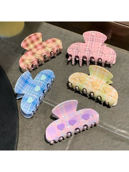 Side view of Beau Fresh Plaid Acetate Hair Clip displaying metal clasp mechanism